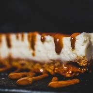 Cheesecake Chocolate Blanco con cobertura de Lotus